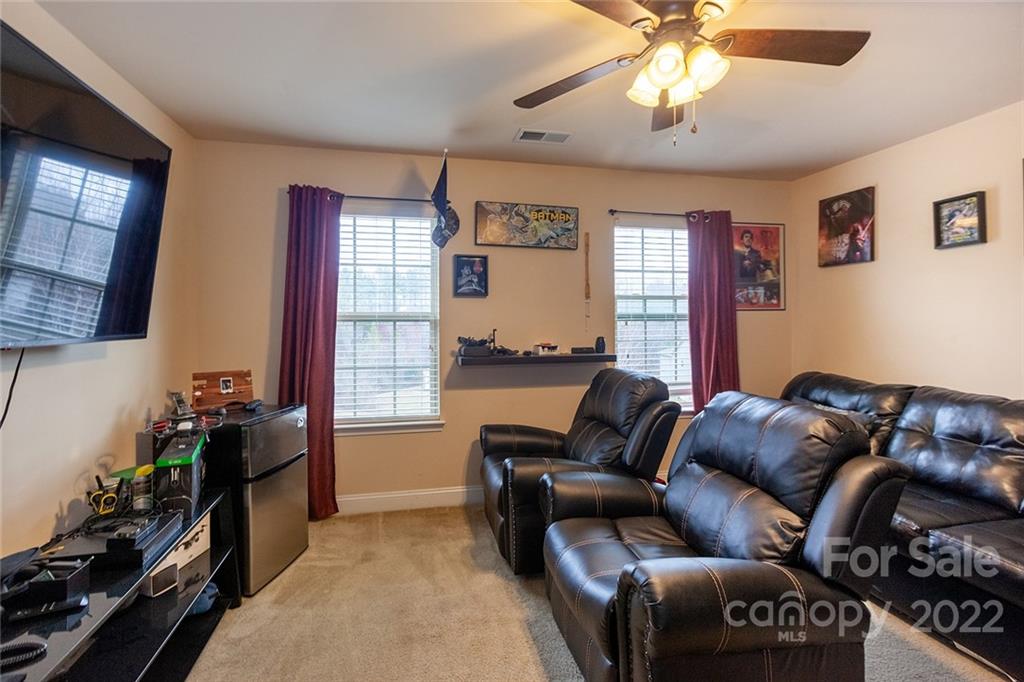 688 Winding Branch Road Rock Hill, SC 29732 - Photo 30 of 38 a living room with furniture and a window