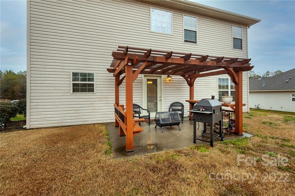 688 Winding Branch Road Rock Hill, SC 29732 - Photo 35 of 38 a view of a house with backyard and sitting area