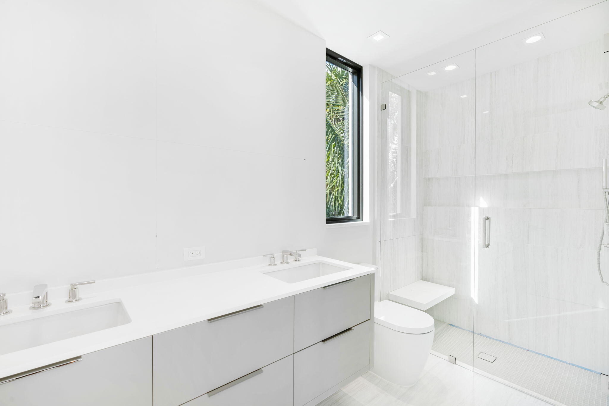 2291 Ibis Isle Road East Palm Beach, FL 33480 - Photo 21 of 32 a bathroom with a sink a toilet and shower