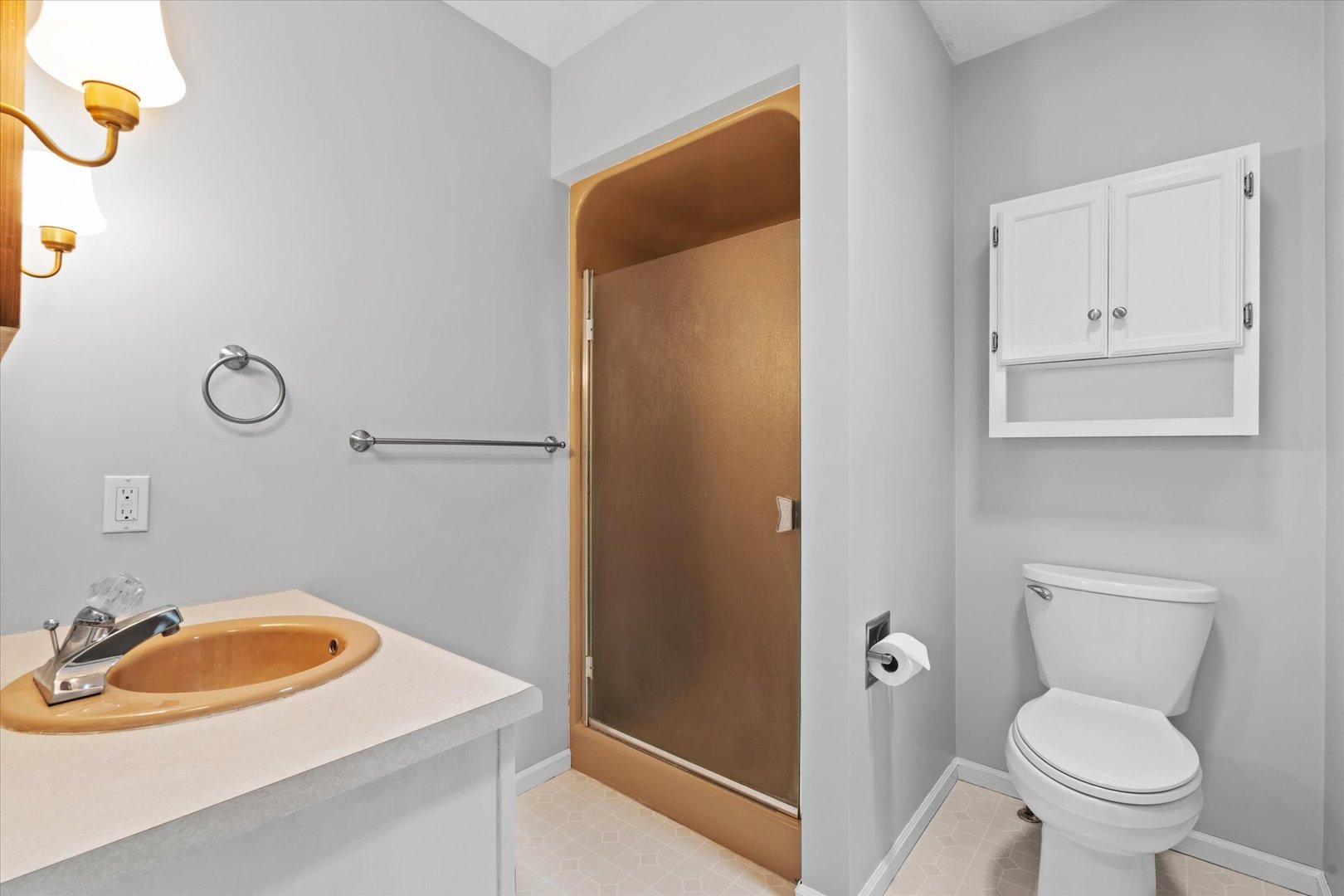 10 Oak Grove Road Geneseo, IL 61254 - Photo 26 of 43 a bathroom with a sink toilet and shower