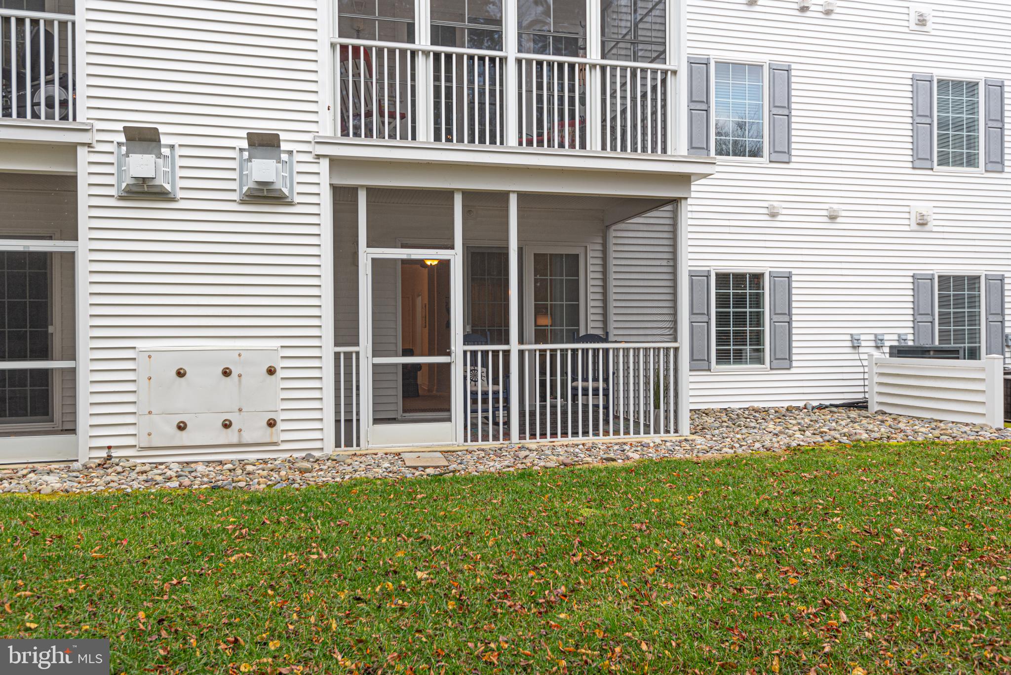 30611 Cedar Neck Road, Unit 2103 Ocean View, DE 19970 - Photo 17 of 44 Screened porch and storage closet