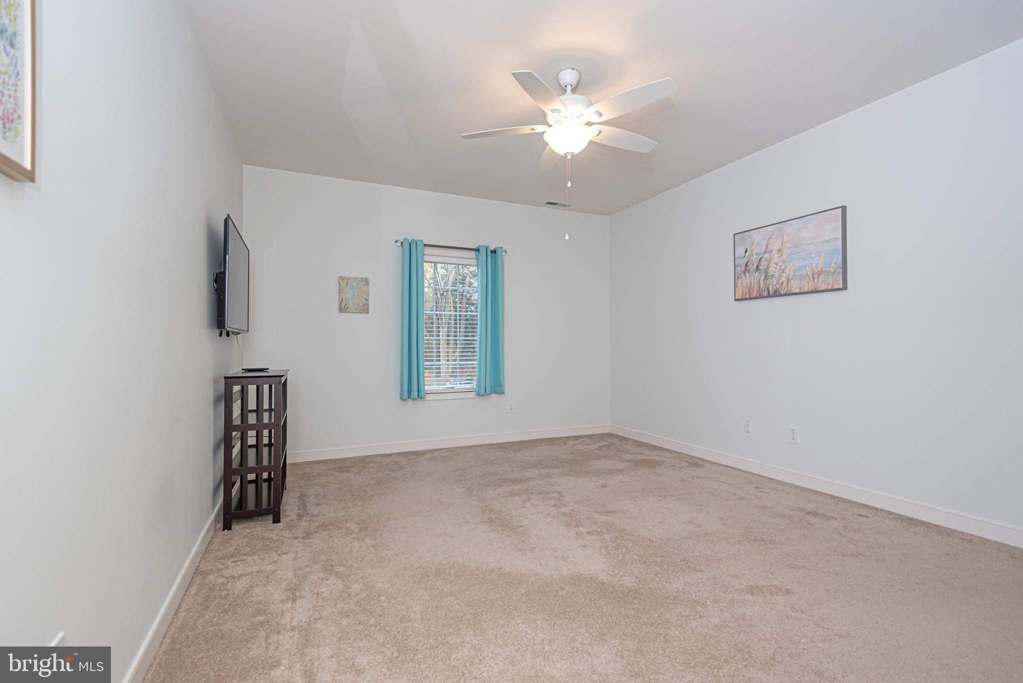 30611 Cedar Neck Road, Unit 2103 Ocean View, DE 19970 - Photo 27 of 44 Owner's Bedroom Suite