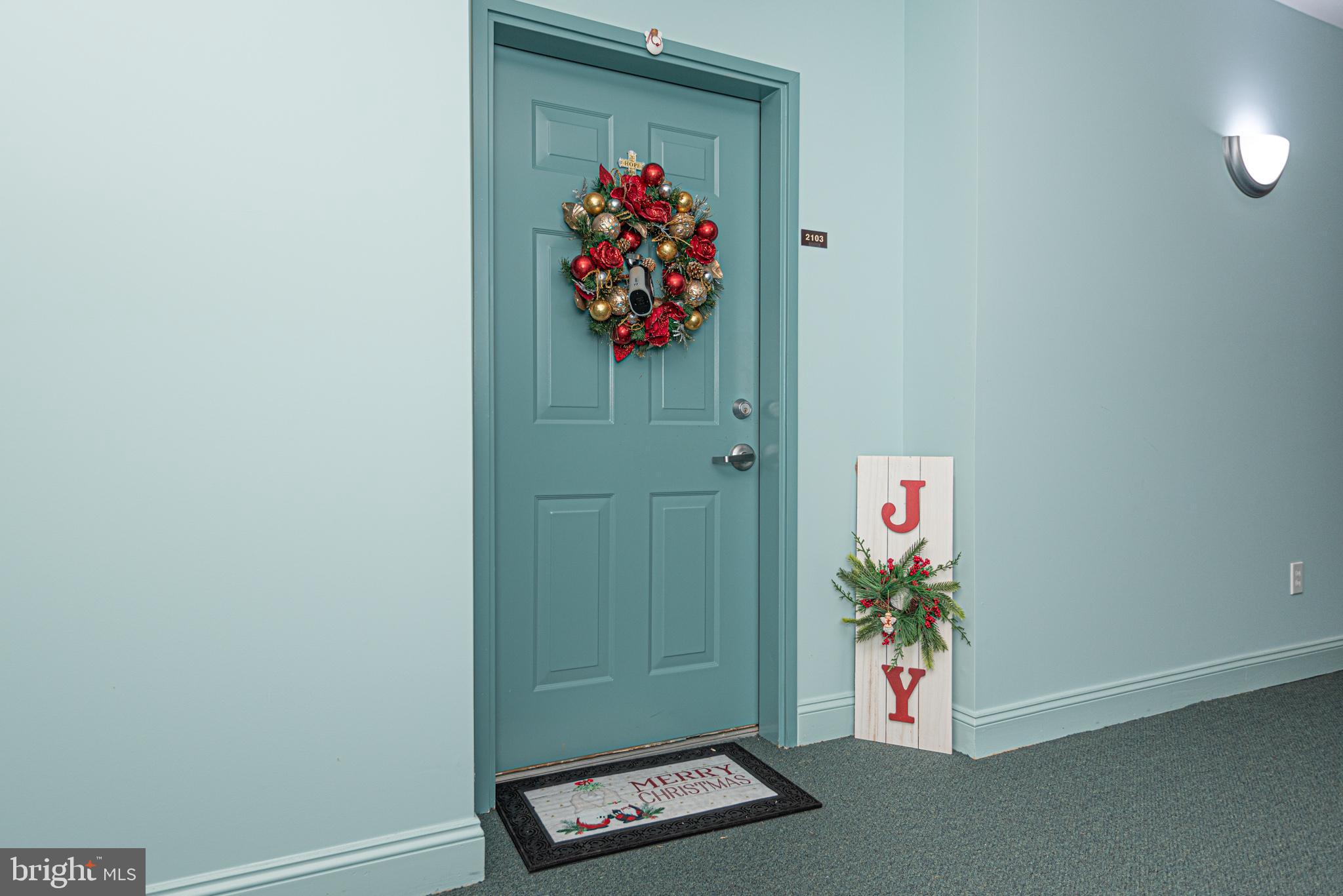 30611 Cedar Neck Road, Unit 2103 Ocean View, DE 19970 - Photo 37 of 44 Welcoming entry door to condo