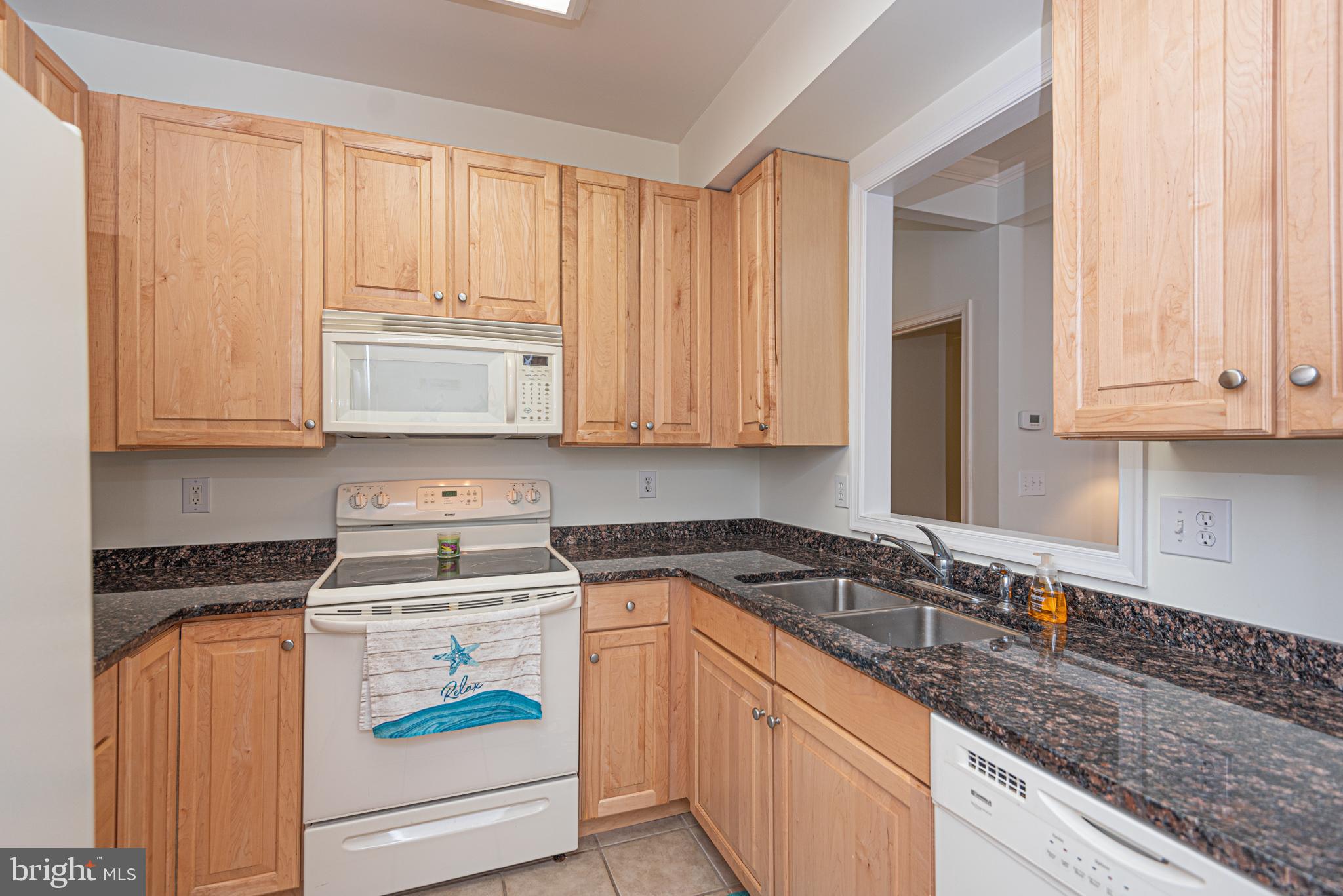 30611 Cedar Neck Road, Unit 2103 Ocean View, DE 19970 - Photo 5 of 44 Kitchen with tile floors