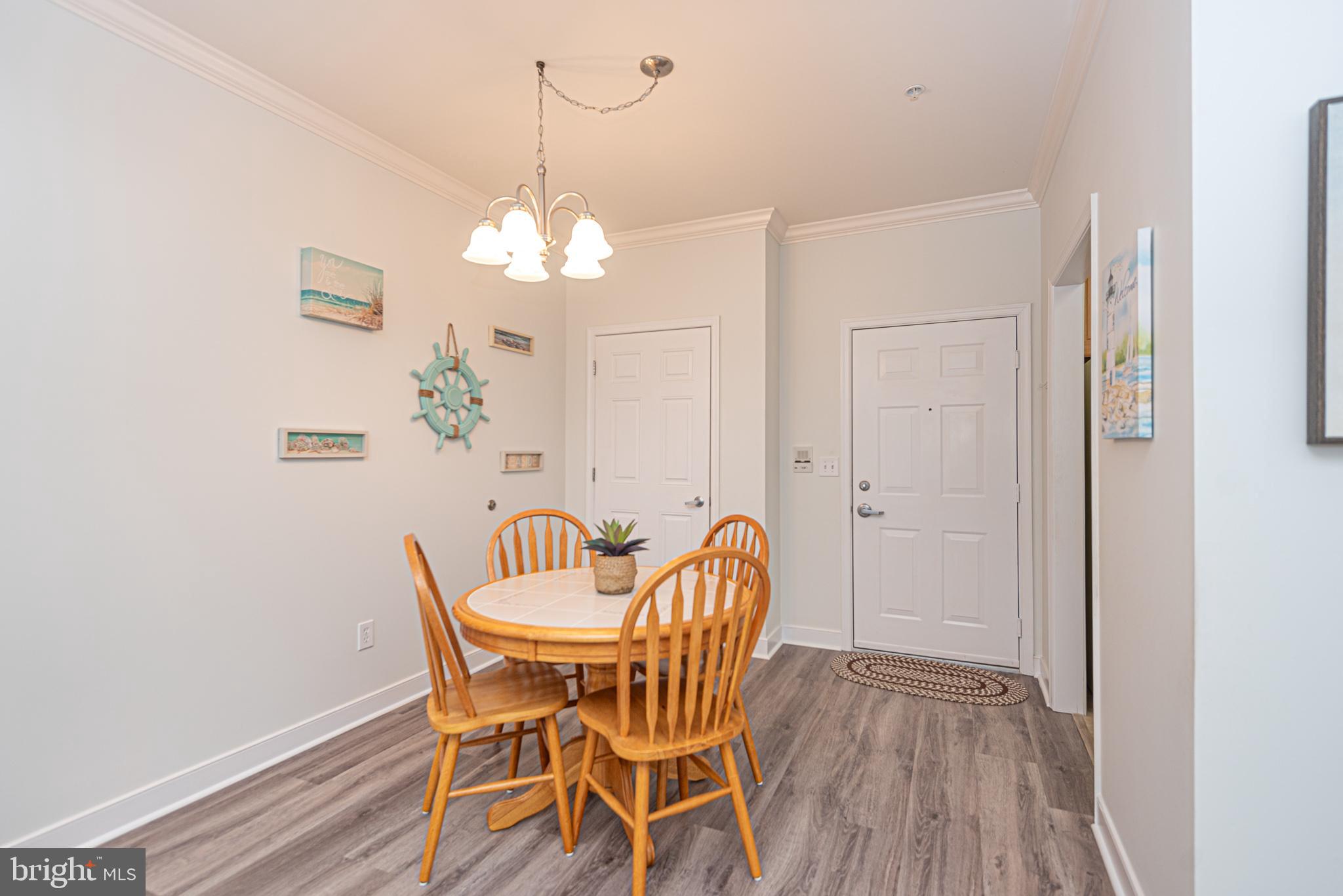 30611 Cedar Neck Road, Unit 2103 Ocean View, DE 19970 - Photo 6 of 44 Front door to dining room