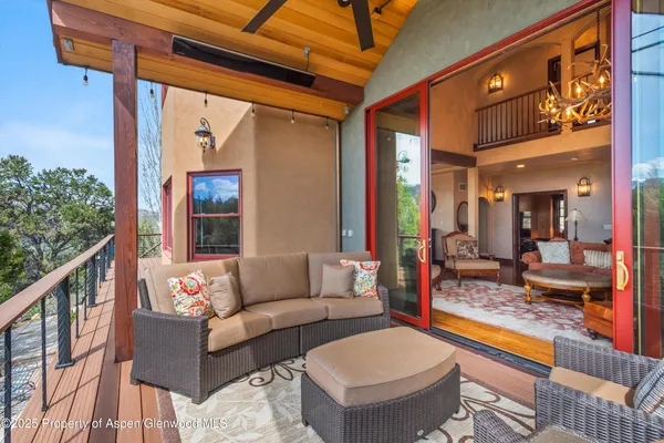 a outdoor living space with furniture and a potted plant