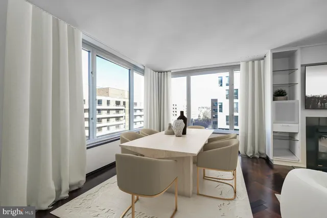 a dining room with furniture window wooden floor