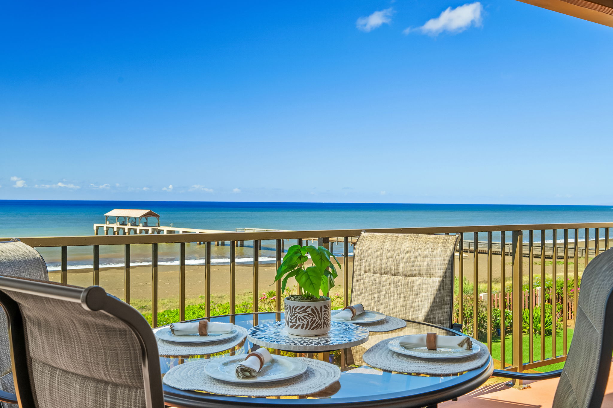 4451 Moana Road, Unit 309 Waimea, HI 96796 - Photo 11 of 21 a view of a balcony with food and a dining table