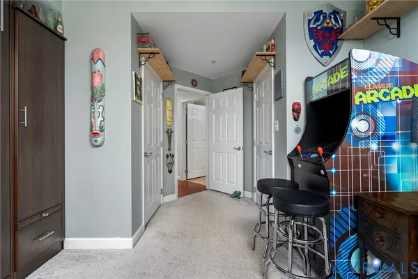 a view of a brick building next to a yard