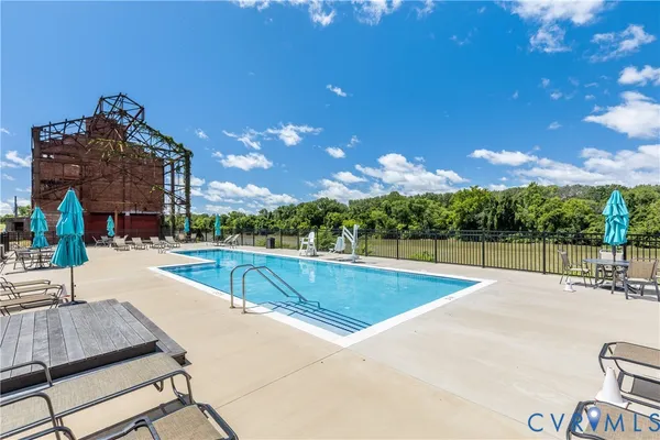 a view of a swimming pool and outdoor space