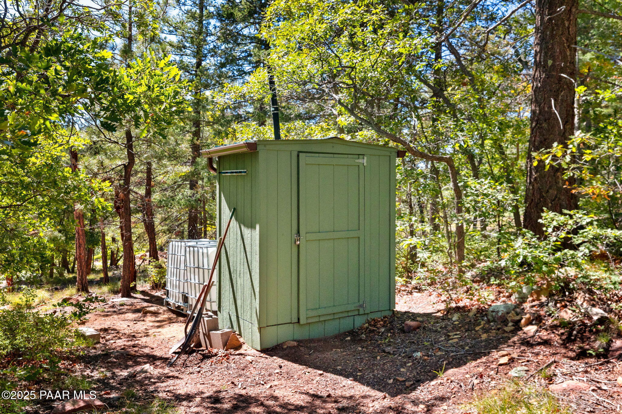 318 East Poland Road Prescott, AZ 86303 - Photo 17 of 28 a green field with trees in the background