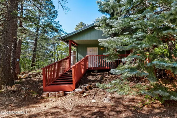 a view of a bench in a backyard
