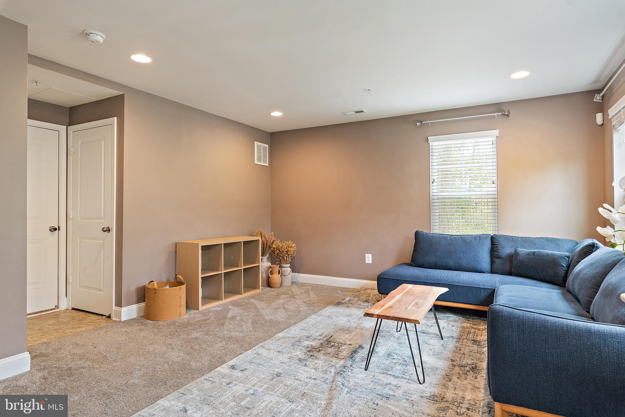 1614 Belle Drive Annapolis, MD 21401 - Photo 12 of 36 a living room with furniture and a window