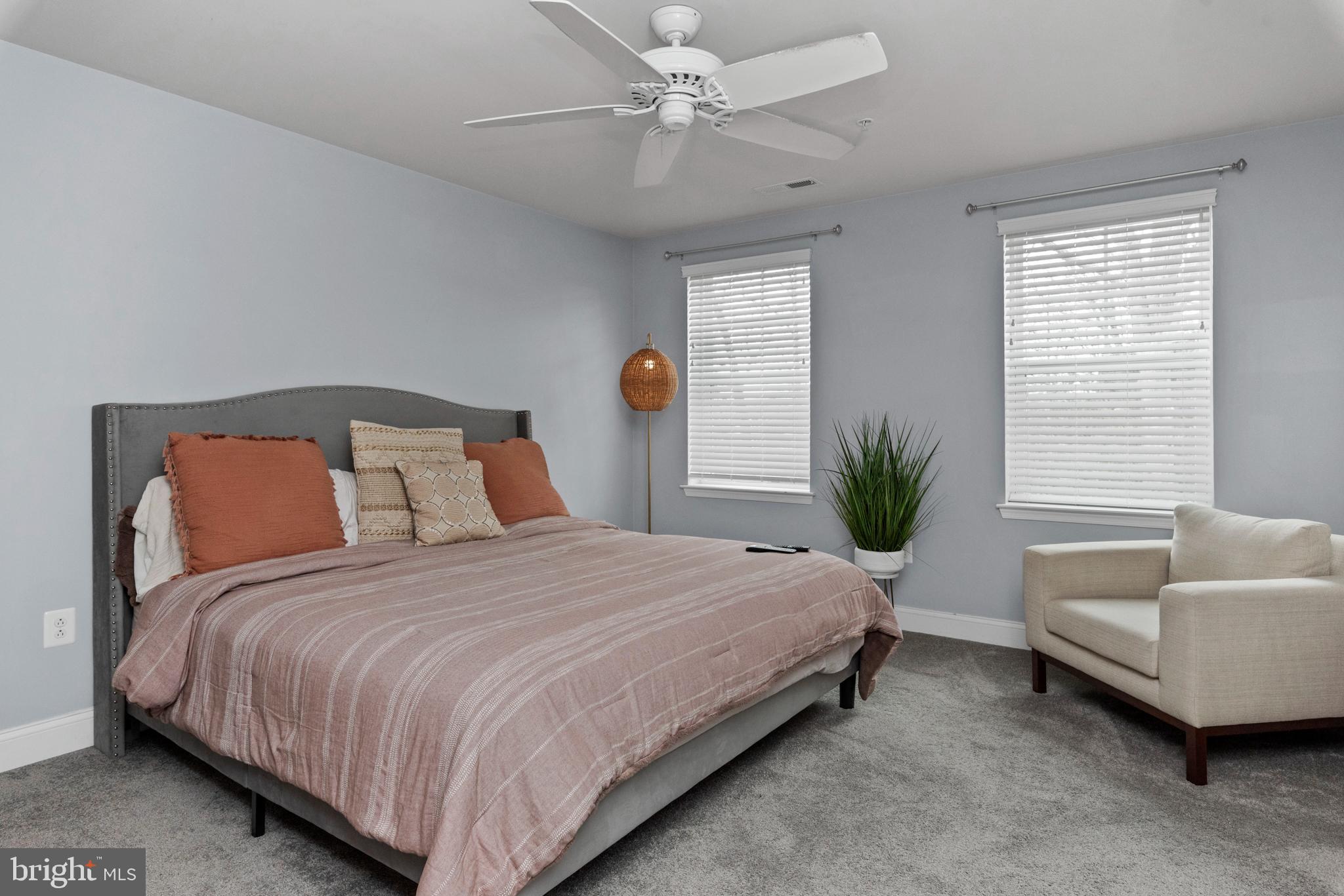 1614 Belle Drive Annapolis, MD 21401 - Photo 21 of 36 a bedroom with bed and a couch