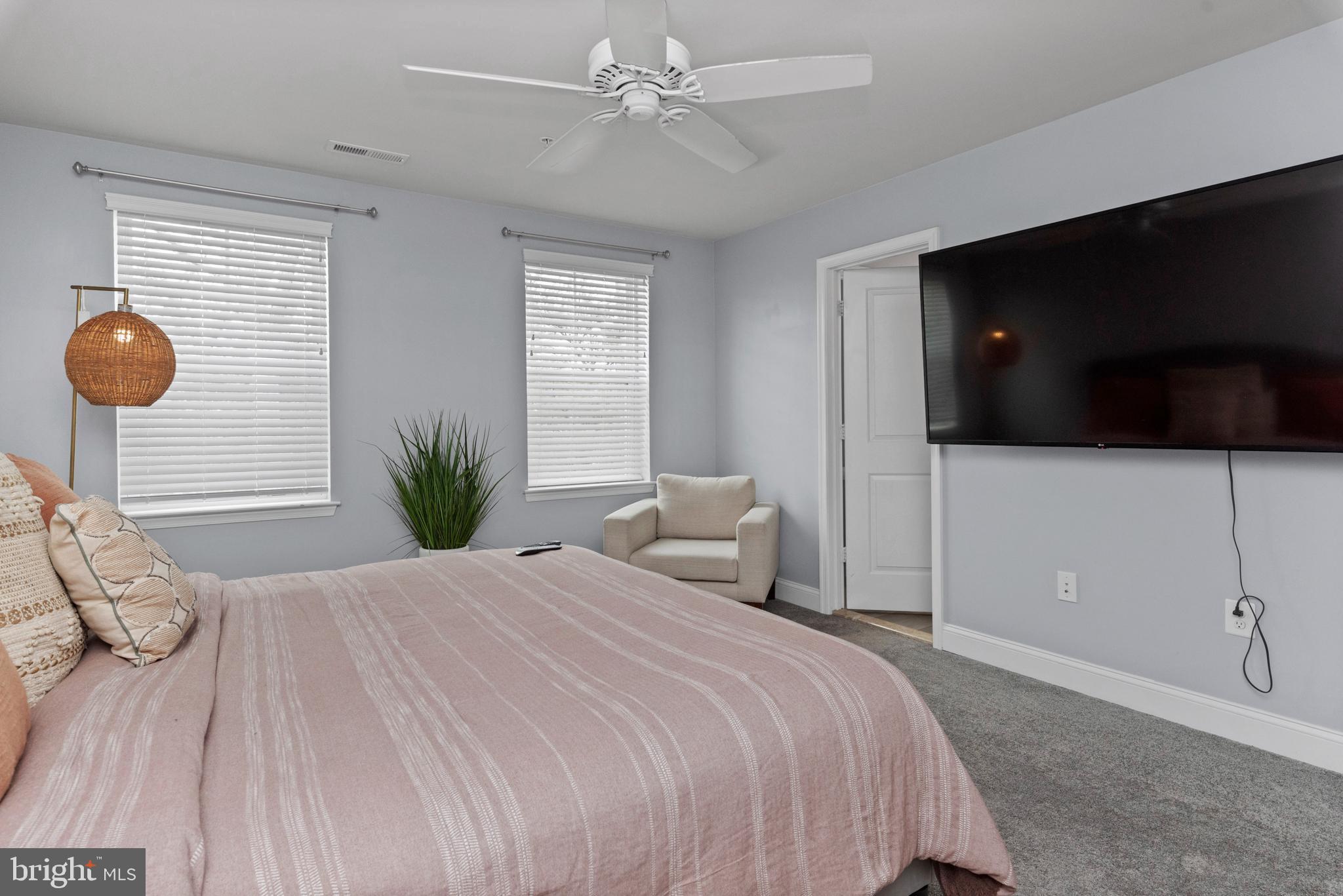 1614 Belle Drive Annapolis, MD 21401 - Photo 22 of 36 a bedroom with a bed and a flat screen tv