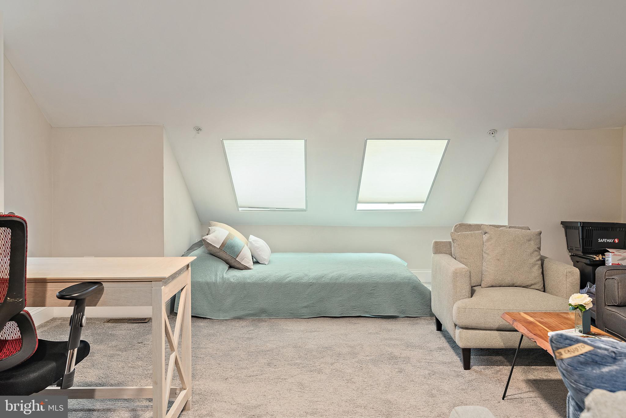 1614 Belle Drive Annapolis, MD 21401 - Photo 28 of 36 a bedroom with a bed and a chair