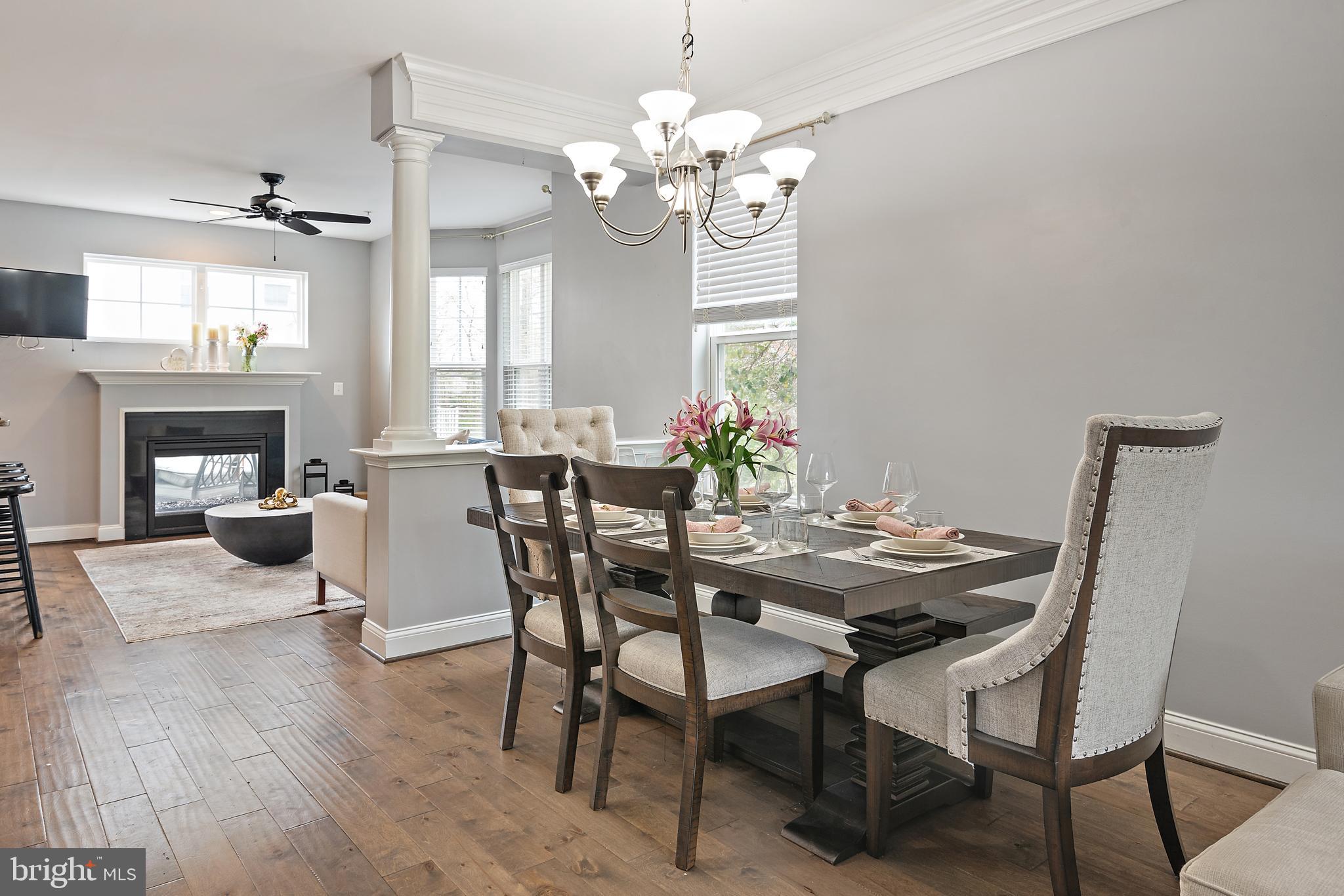 1614 Belle Drive Annapolis, MD 21401 - Photo 3 of 36 a view of a dining room with furniture and chandelier