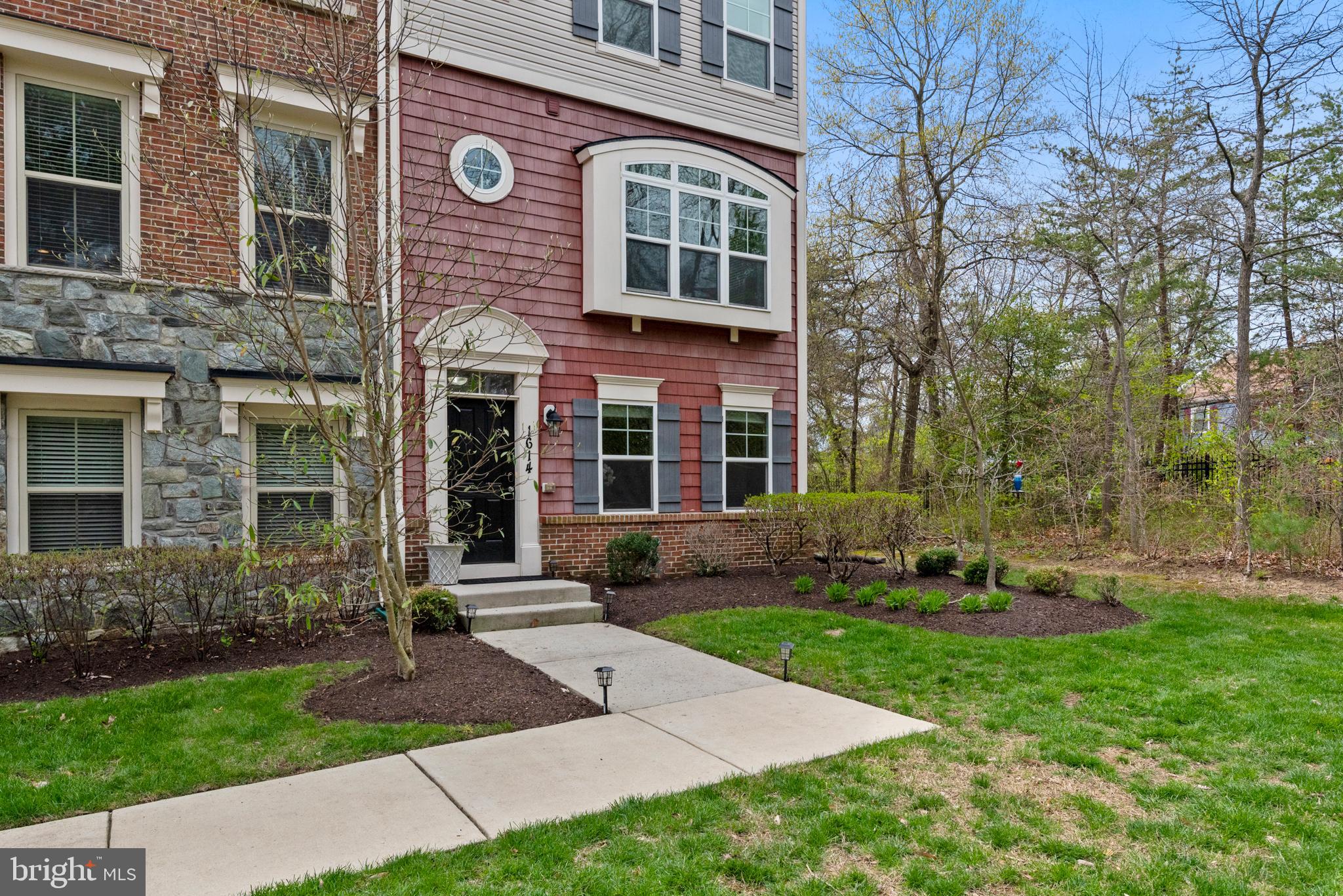 1614 Belle Drive Annapolis, MD 21401 - Photo 35 of 36 a front view of a house with garden