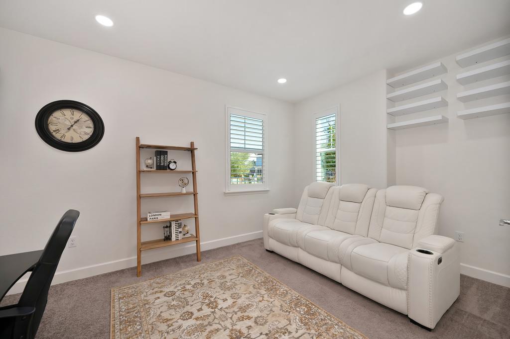 17500 Beachwood Road Lathrop, CA 95330 - Photo 16 of 78 a living room with furniture and a window