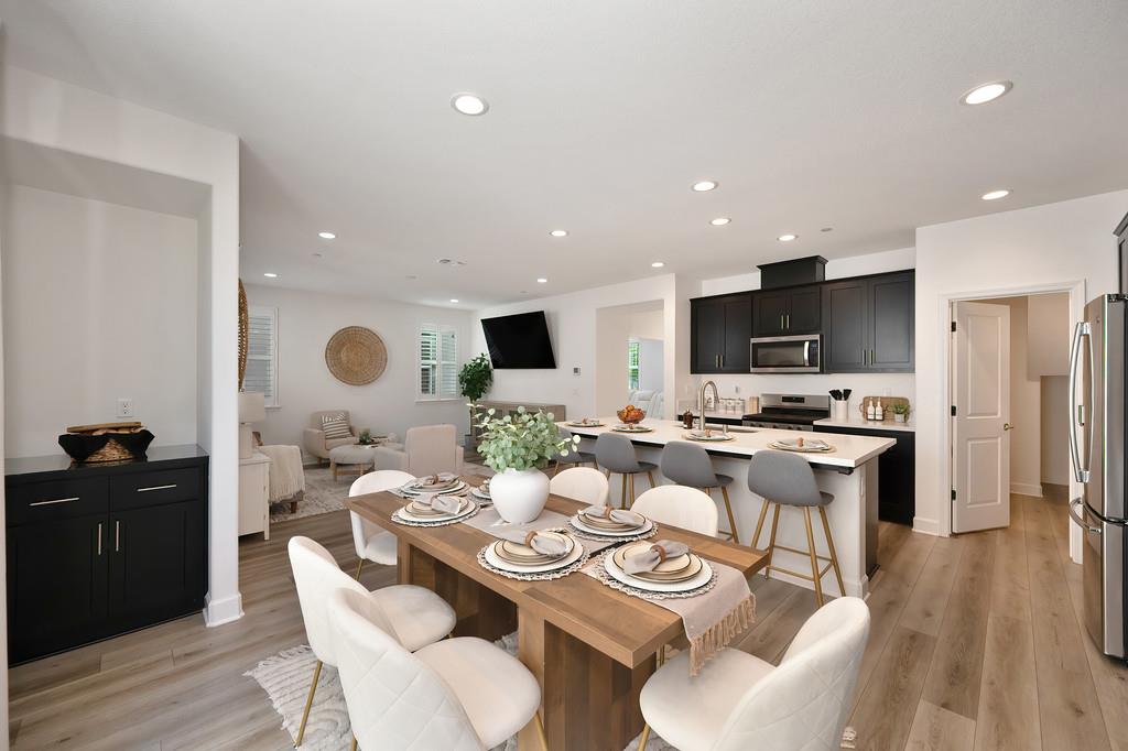 17500 Beachwood Road Lathrop, CA 95330 - Photo 30 of 78 a view of a dining room with furniture