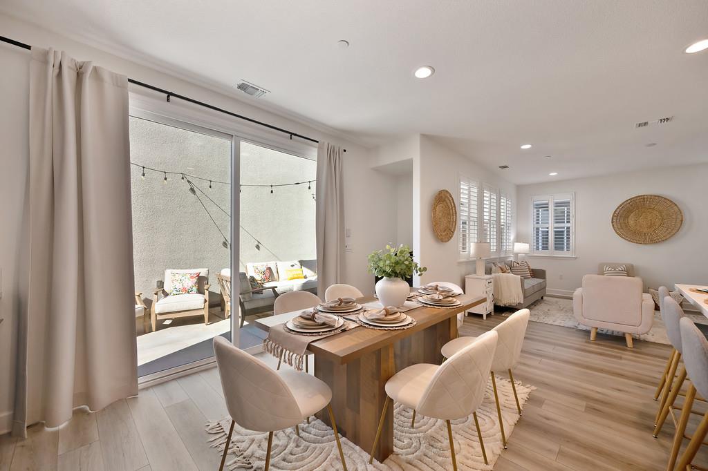 17500 Beachwood Road Lathrop, CA 95330 - Photo 31 of 78 a living room with fireplace furniture and a large window