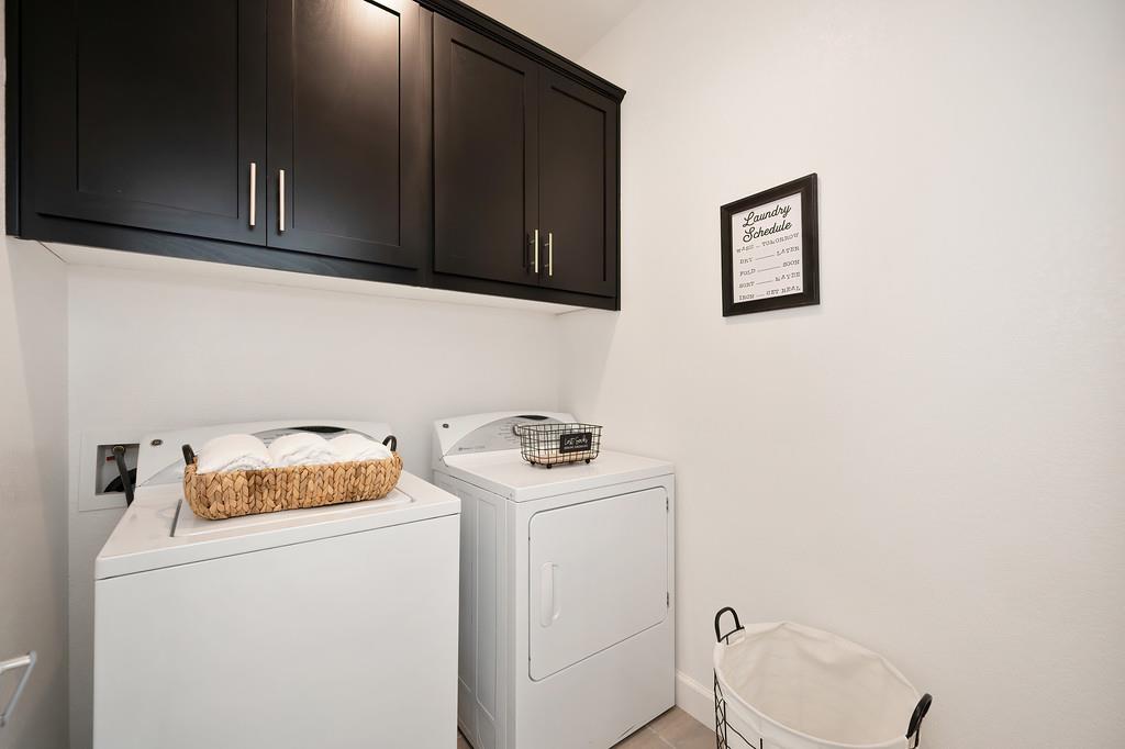 17500 Beachwood Road Lathrop, CA 95330 - Photo 38 of 78 Convenient upstairs laundry room with cabinets.