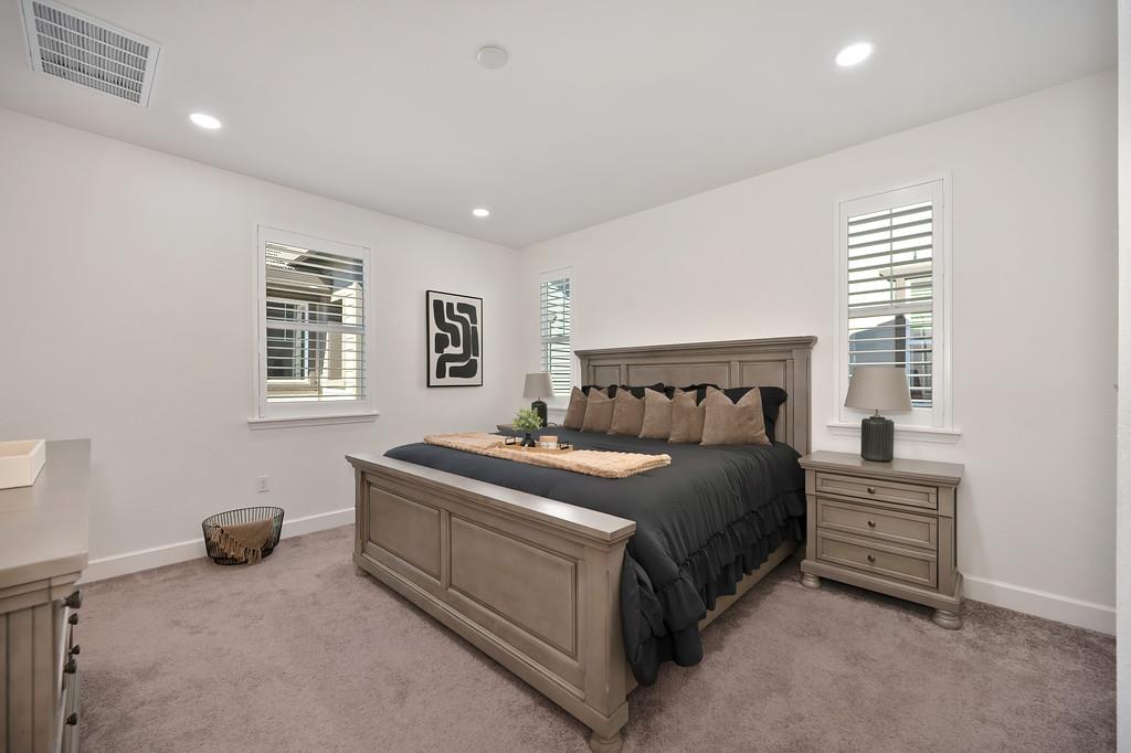 17500 Beachwood Road Lathrop, CA 95330 - Photo 40 of 78 a bedroom with a bed and a window