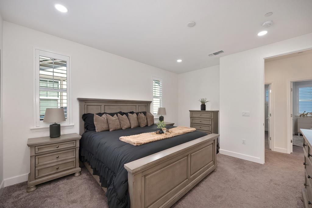 17500 Beachwood Road Lathrop, CA 95330 - Photo 41 of 78 a bedroom with a bed and a dresser