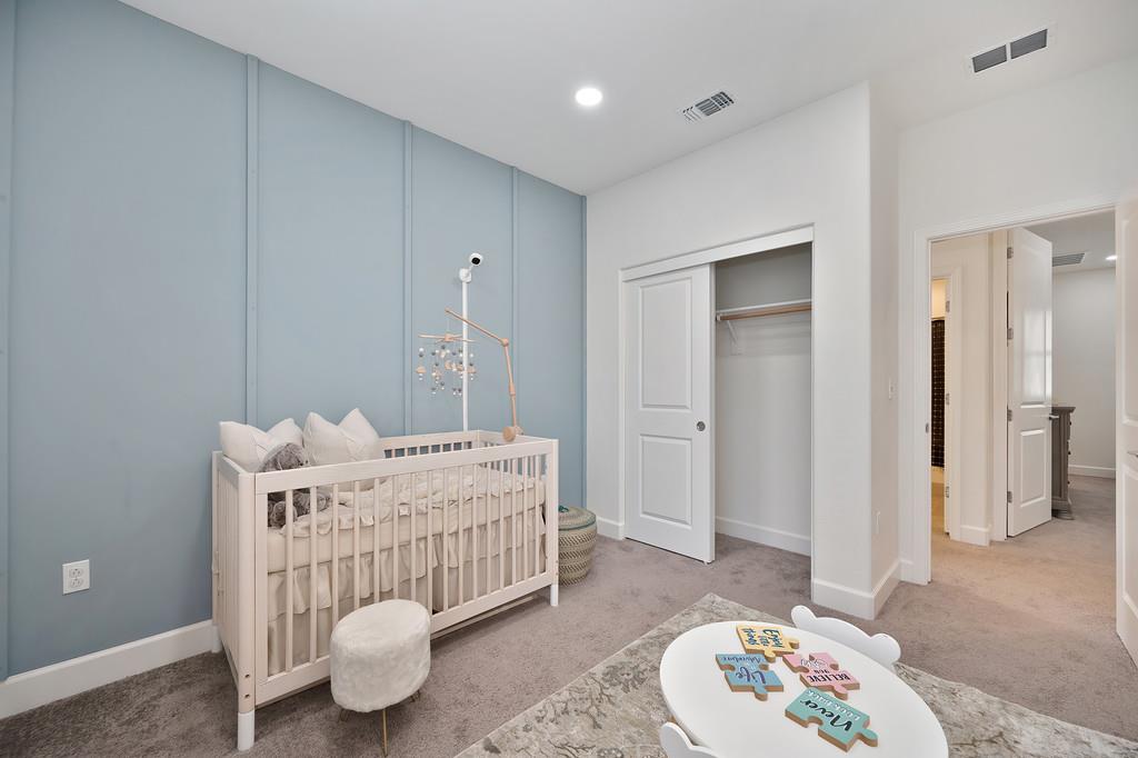 17500 Beachwood Road Lathrop, CA 95330 - Photo 48 of 78 a bedroom with a bed and a table