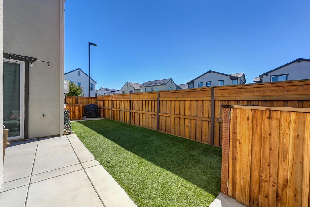 17500 Beachwood Road Lathrop, CA 95330 - Photo 61 of 78 a view of a back yard of the house