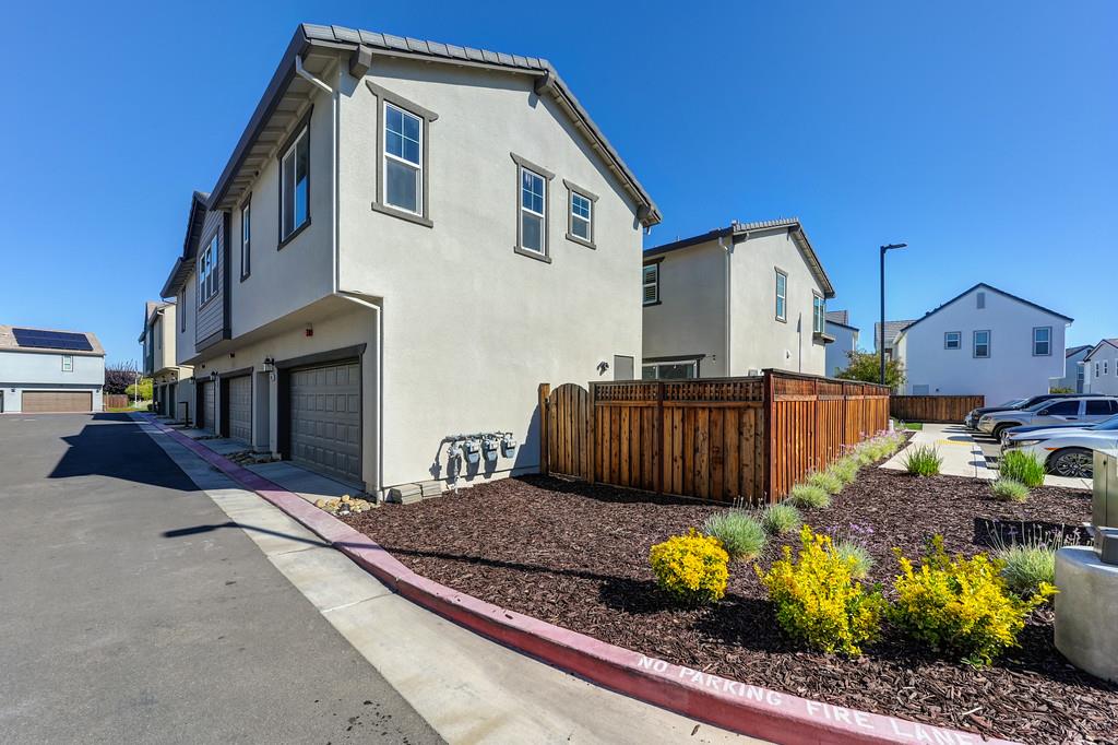 17500 Beachwood Road Lathrop, CA 95330 - Photo 67 of 78 a front view of a house with a yard