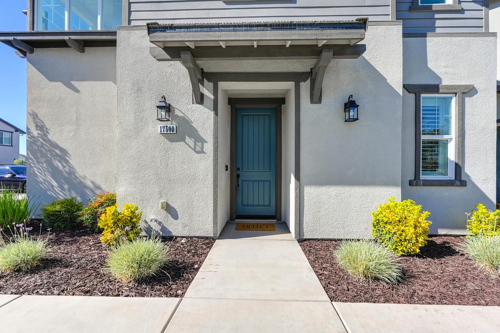 17500 Beachwood Road Lathrop, CA 95330 - Photo 7 of 78 a front view of a house with outdoor space