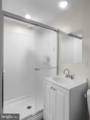 a view of a house with garden and deck