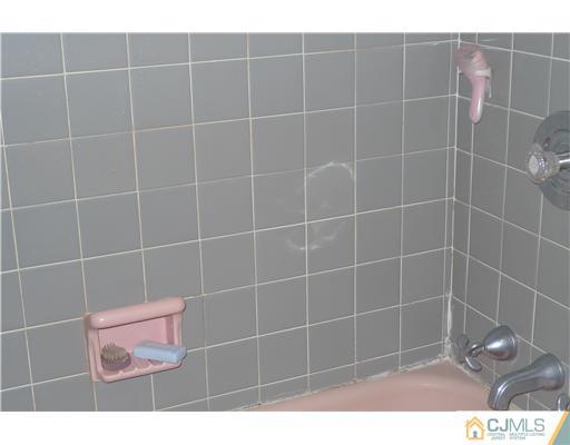 1707 River Road Belmar, NJ 07719 - Photo 11 of 17 a bathroom with a toilet