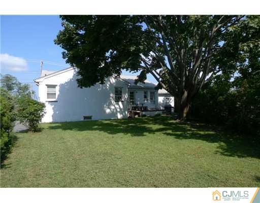 1707 River Road Belmar, NJ 07719 - Photo 13 of 17 a view of a house with a big yard