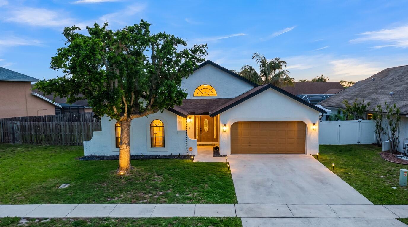22625 Blue Fin Trail Boca Raton, FL 33428 - Photo 2 of 35 Evening Front View