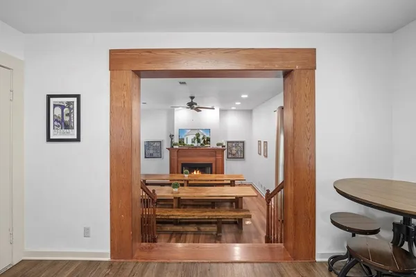 a view of kitchen with furniture and wooden floor