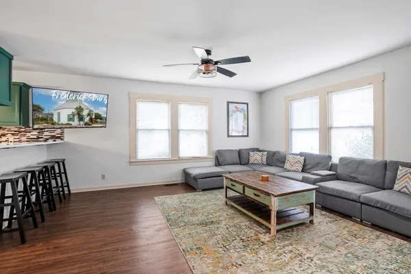 a living room with furniture and a window