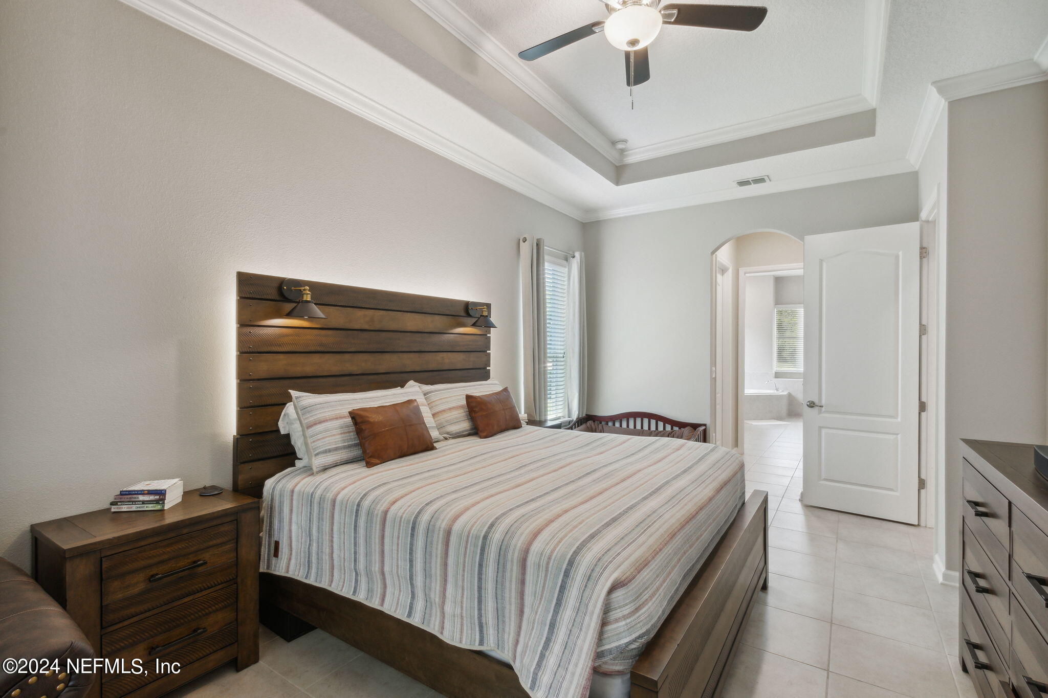 369 Medio Drive St. Augustine, FL 32095 - Photo 13 of 25 a bedroom with a bed and a dresser