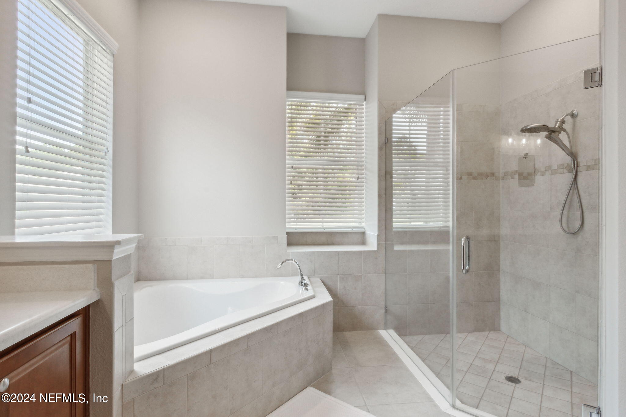 369 Medio Drive St. Augustine, FL 32095 - Photo 15 of 25 a bathroom with a bathtub and shower