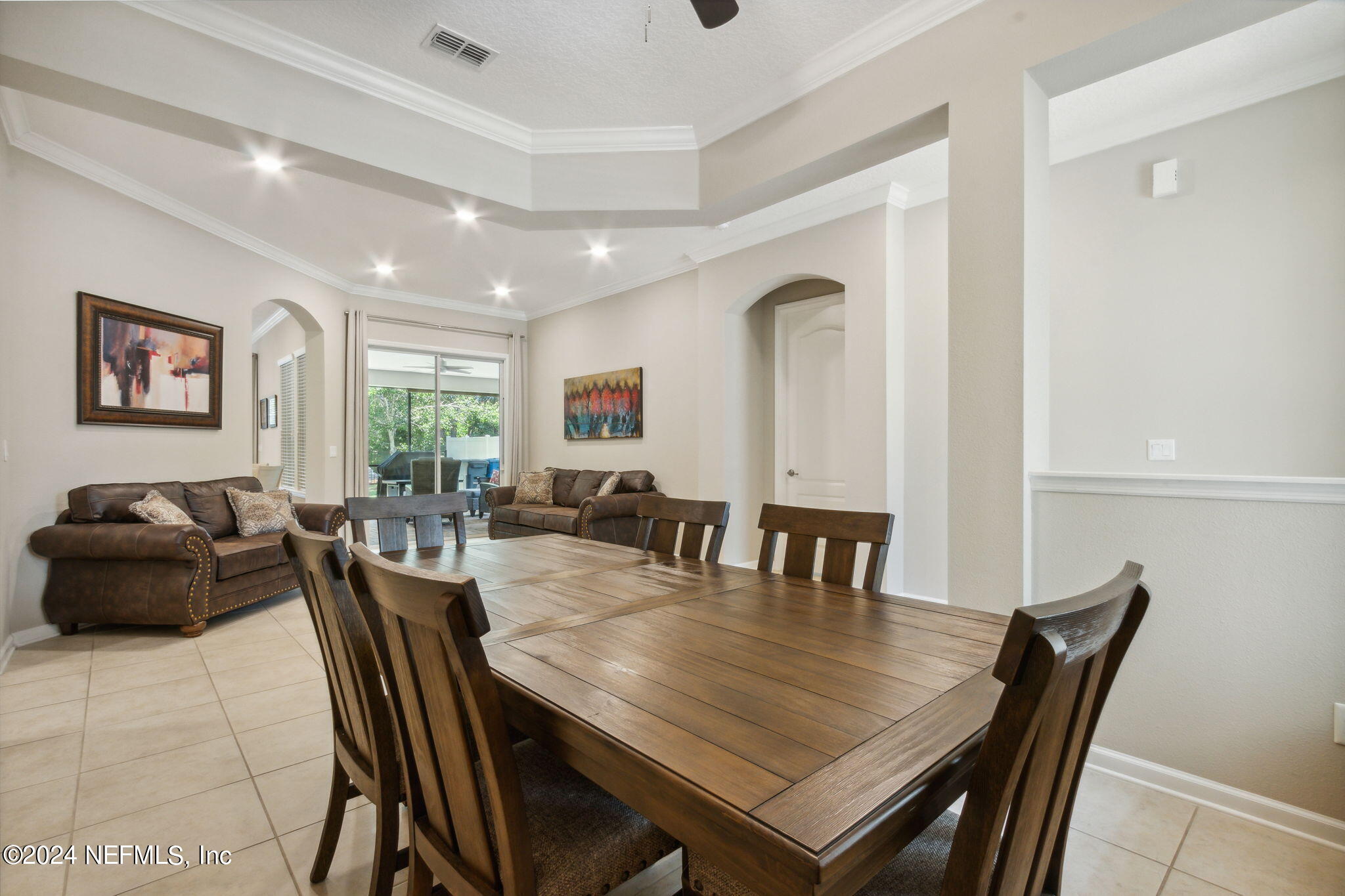 369 Medio Drive St. Augustine, FL 32095 - Photo 5 of 25 a view of a dining room with furniture and window