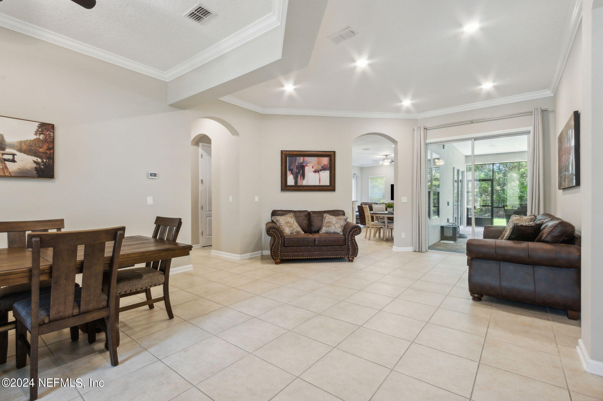 369 Medio Drive St. Augustine, FL 32095 - Photo 6 of 25 a living room with furniture and a large window