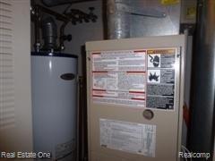 3521 Oakmonte Boulevard, Unit 74 Rochester, MI 48306 - Photo 19 of 31 Furnace and New Hot Water Heater