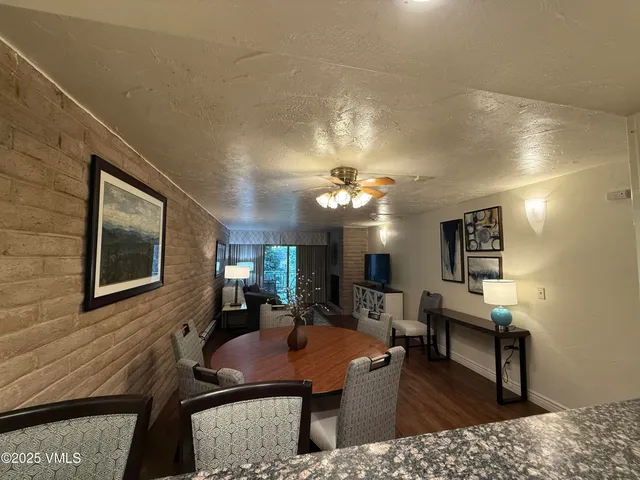 a view of a livingroom with furniture and window