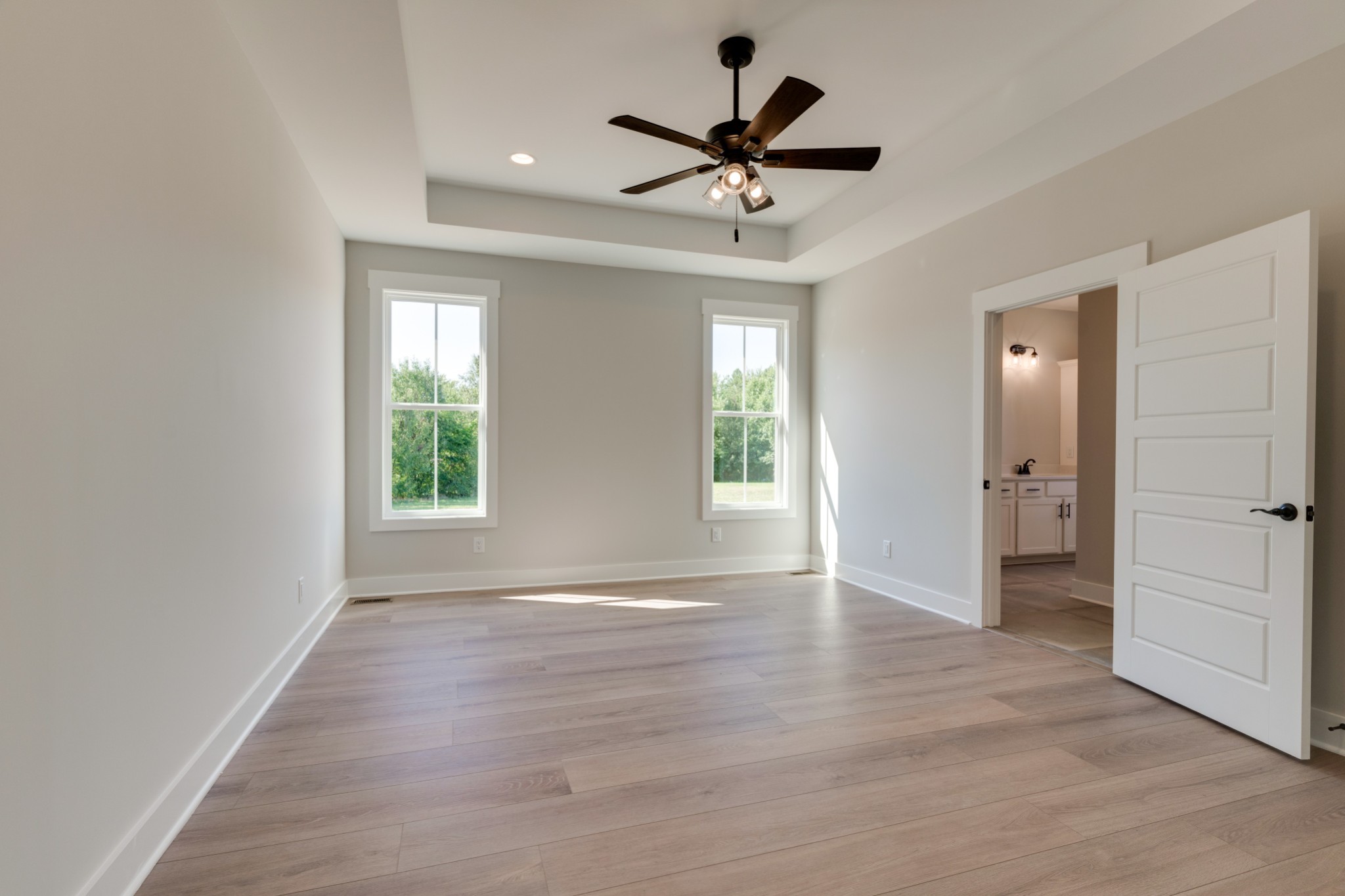 5046 Mt Zion Road Springfield, TN 37172 - Photo 11 of 28 a view of an empty room with wooden floor and a window