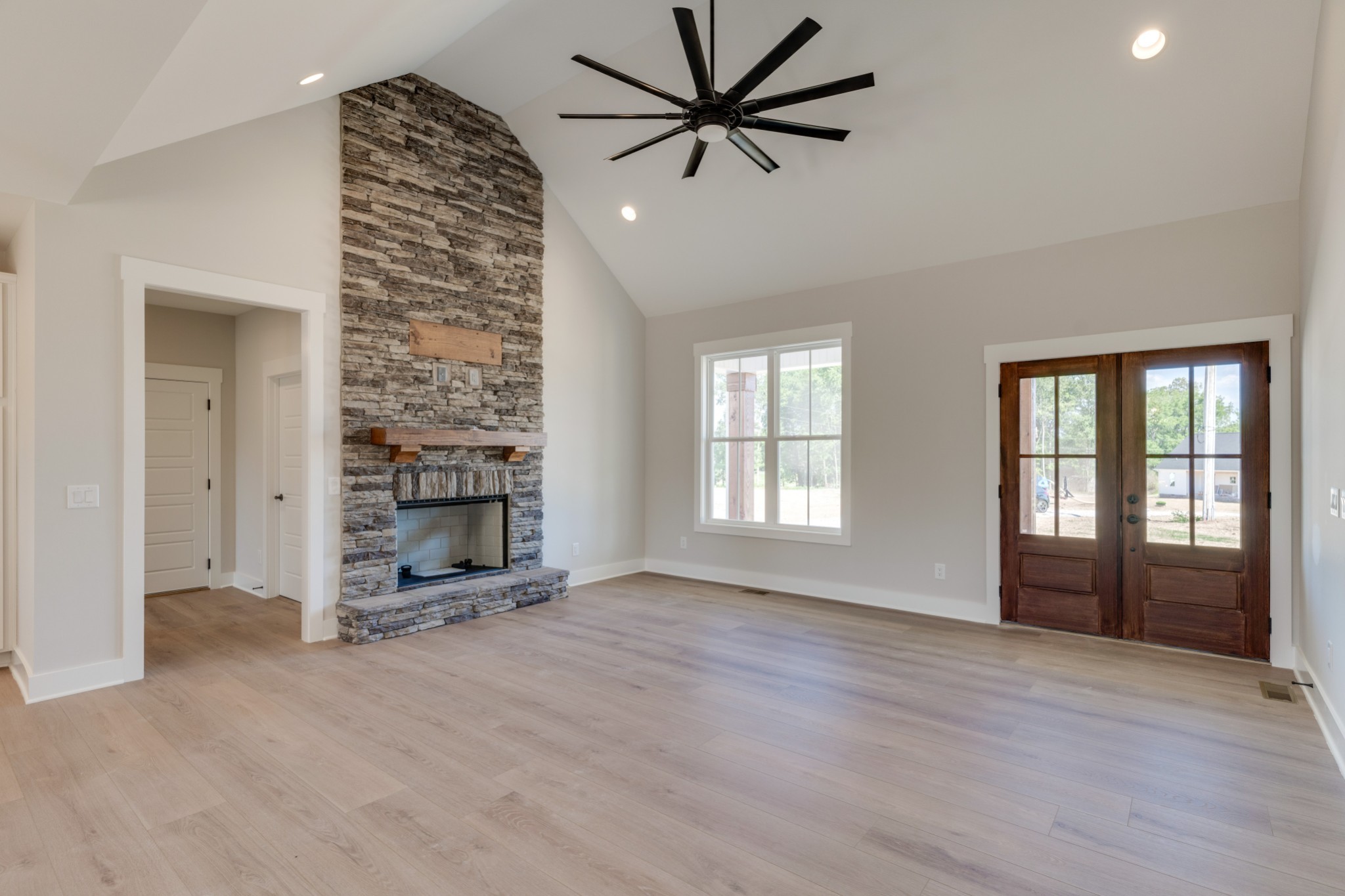 5046 Mt Zion Road Springfield, TN 37172 - Photo 4 of 28 wooden floor in an empty room with a fireplace