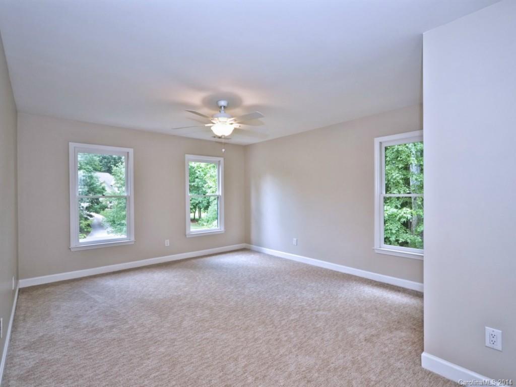13504 Scanlan Way Davidson, NC 28036 - Photo 17 of 23 an empty room with windows and closet
