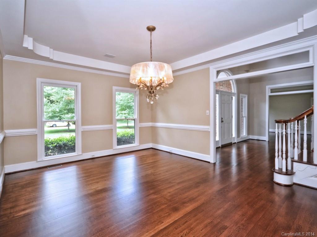 13504 Scanlan Way Davidson, NC 28036 - Photo 5 of 23 a view of a livingroom with wooden floor and a large window