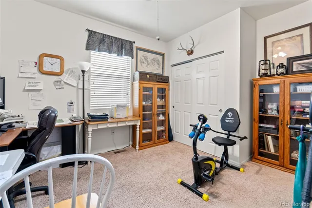 a open kitchen with stainless steel appliances granite countertop a stove and refrigerator