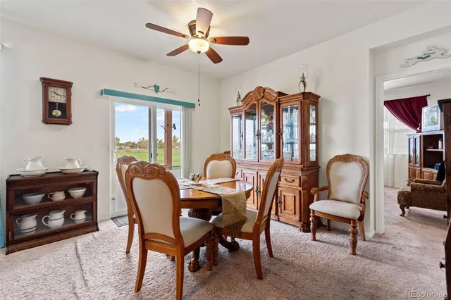 a bed room with a bed and a large window